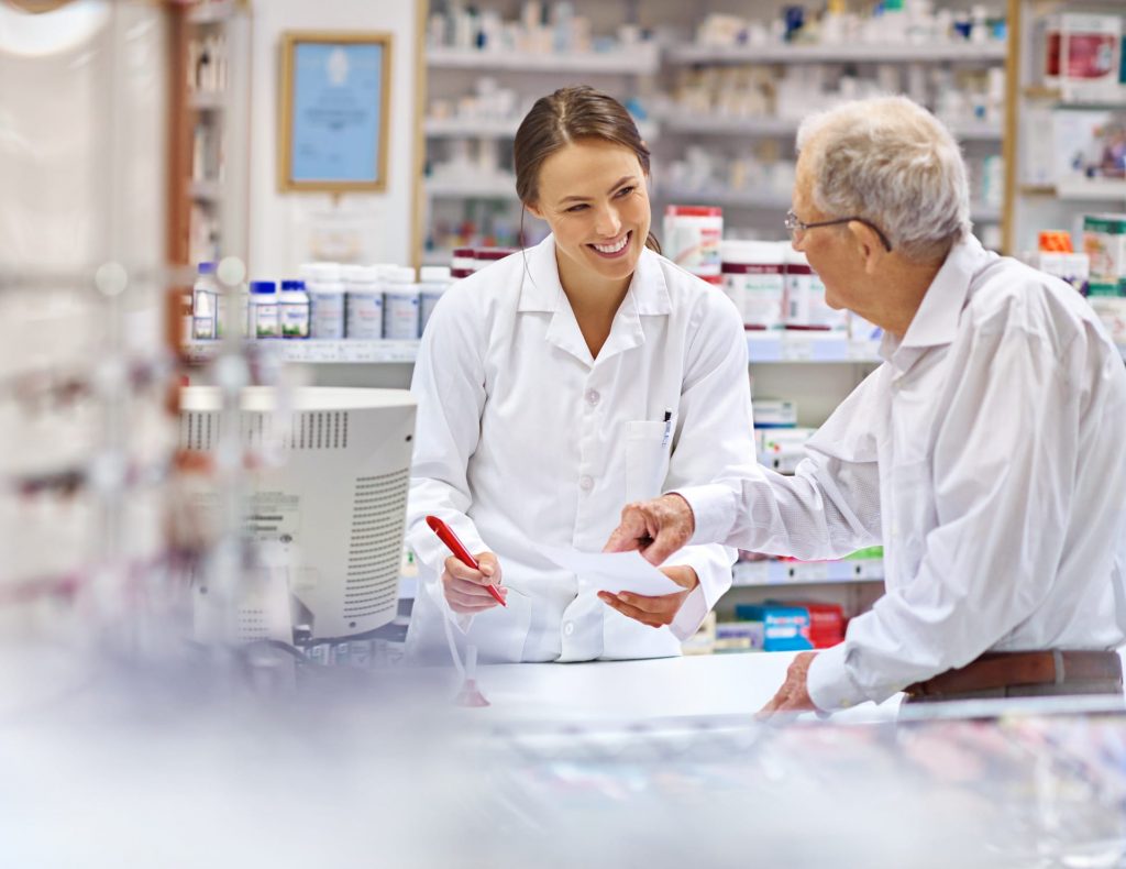 Shot of a young pharmacist helping an elderly customer at the prescription counter. The commercial product(s) or designs displayed in this image represent simulations of a real product, and are changed or altered enough so that they are free of any copyright infringements. Our team of retouching and design specialists custom designed these elements for each photo shoot http://195.154.178.81/DATA/i_collage/pi/shoots/785200.jpg